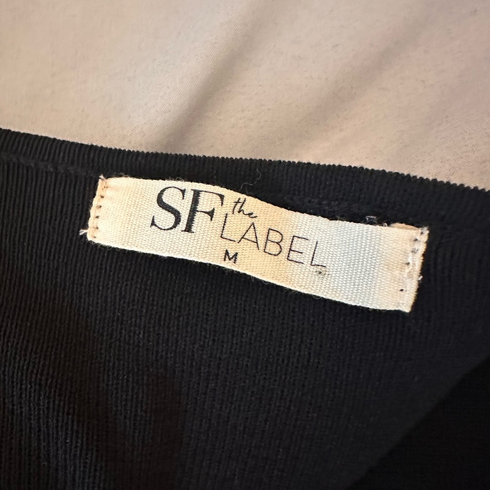 Black, long dress, thick material, waist cut outs, long sleeves